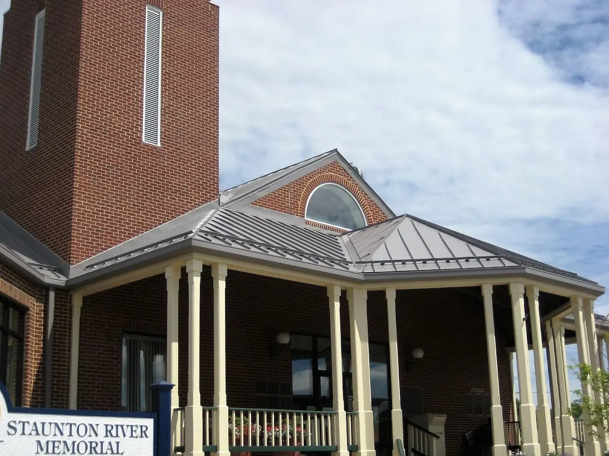 Skilled roofing craftsmen working on a residential roof in Greater Mulwood